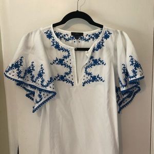 White J Crew top with deep blue embroidery